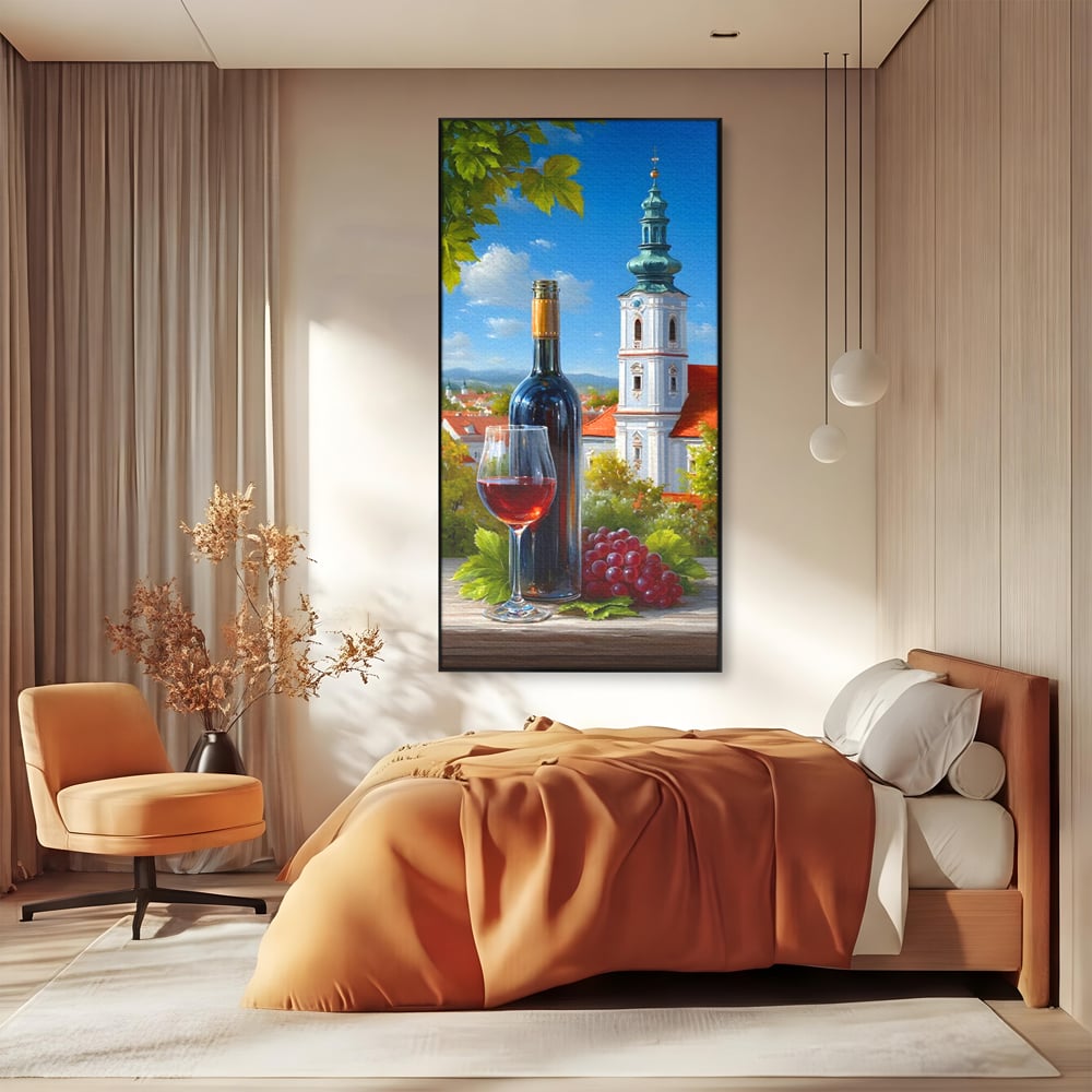 Tablou canvas cu pictura cu sticla de vin si manastire, in rama de aluminiu negru, pe perete intr-un dormitor